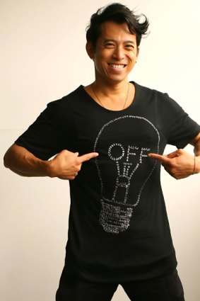 Light-bulb moment  ...  Bowie Wong with his  Earth Hour T-shirt  for auction.