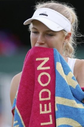 Caroline Wozniacki takes a breather during her match against Barbora Zahlavova Strycova.