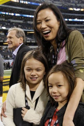 'Hated' ... Deng with daughters Chloe, right, and Grace.