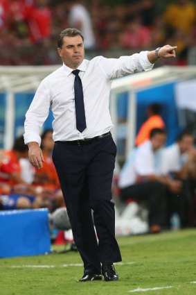 Ange Postecoglou gestures from the sidelines during Australia's loss