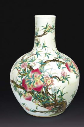 A famille rose peach vase, Tianqiuping, Qing dynasty, 19th century. Estimated to be worth between $30,000 to $40,000.