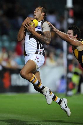 Hawthorn's Lance Franklin marks in front of Richmond's David Gourdis.
