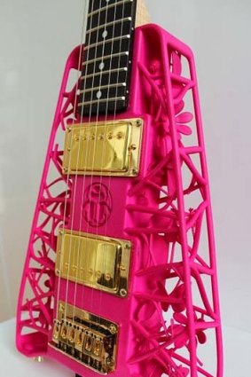 A close-up of a 3D-printed guitar.