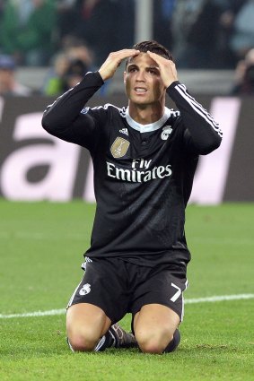Cristiano Ronaldo reacts after missing a chance.