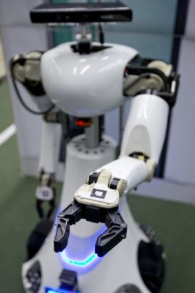 Amigo, a white robot the size of a person. The US Army is considering replacing soldiers with robots.