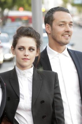 Kristen Stewart poses with director Rupert Sanders, with whom she has admitted having a fling.