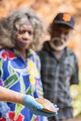 Traditional owners May Nango and Mark Djanjomerr with one of the discoveries.