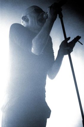 Frontman Andrew Eldritch on stage.