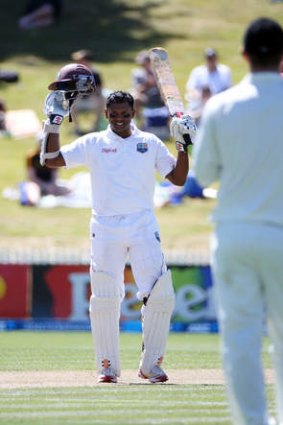 Shivnarine Chanderpaul celebrates his century during the third Test against New Zealand.