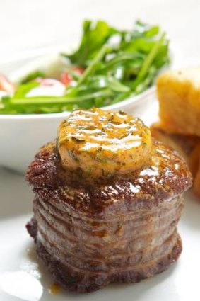 Steak with cafe de Paris herbed sauce features on the easy-please menu at Six Keys.