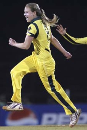 Dual international Ellyse Perry celebrates taking the wicket of the West Indies' Stafanie Taylor in the final.