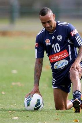 Down and out: Archie Thompson.