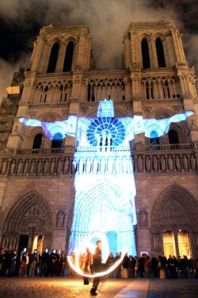 A Christ is projected onto Notre Dame during the Nuit Blanche festival.