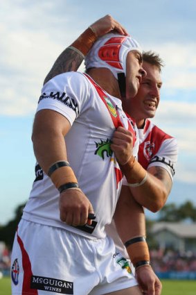 Unlikely fullback: Jamie Soward and Nathan Fien celebrate after Jason Nightingale scores a try at WIN Jubilee Stadium on Sunday.