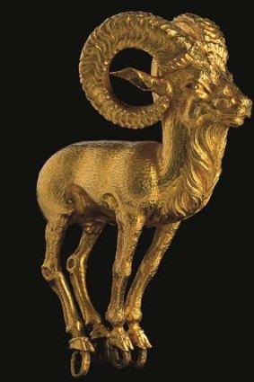 An ancient hairpiece in the shape of a mountain goat.