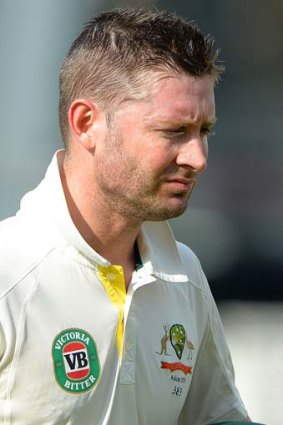 Bitter taste: Michael Clarke leaves the pitch after losing his wicket on the fourth day of play.