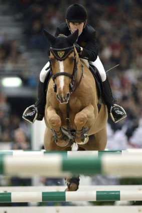 Australian Edwina Tops-Alexander on Cevo Itot du Chateau at the FEI World Cup competition in Geneva.