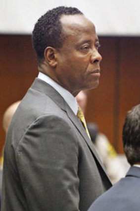 Conrad Murray with his lawyer, Ed Chernoff, in court.