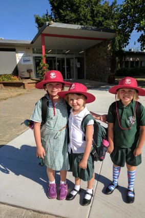 Freyja Christiansen  got to have one day at kindy at Yarralumla Primary School before starting cancer treatment. She is with her big sisters Brynn, and Inge, 