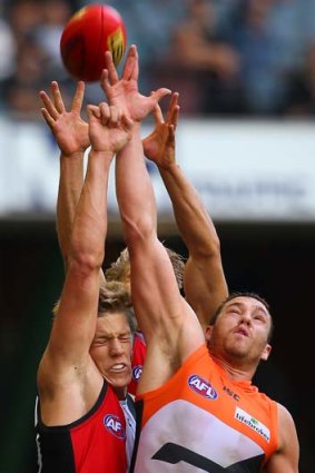 All hands: Shane Mumford (right) and St Kilda’s Rhys Stanley on Saturday.