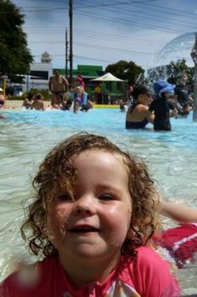 The North Melbourne swimming pool was packed on this very hot day.