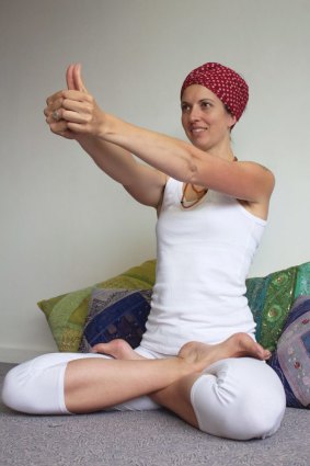 Getting a buzz: Yoga teacher Billie Atherstone practises what she preaches.