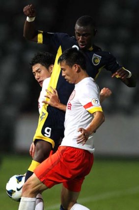 Uncomfortable: Bernie Ibinie, pictured, and the Mariners were never comfortable during their 2-1 win over Guizhou Renhe.