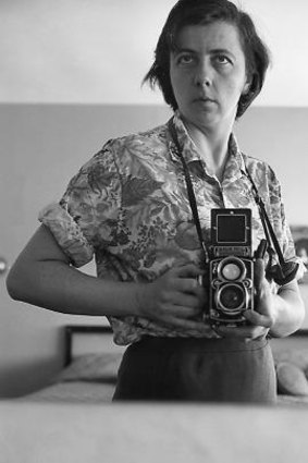 Vivian Maier, in one of her many self-portraits.