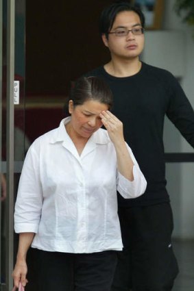2005: Kim Nguyen leaving Singapore's Changi prison, with her son Khoa, after visiting her other son Nguyen Van Tuong, who was then still alive.