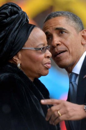 Barack Obama talks with the widow of Nelson Mandela, Graca Machel.