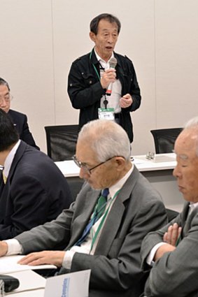 Former plant engineer Yasuteru Yamada addresses the "Skilled Veterans Corp" at their first meeting in Tokyo.