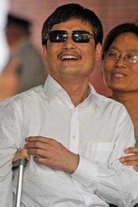 Chinese activist Chen Guangcheng and his wife Yuan Weijing arrive in New York.