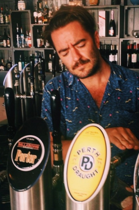 Lachlan Horn pours a drop of his new favourite beer, Perth Draught.