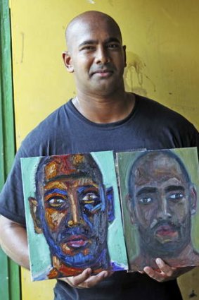 Myuran Sukumaran with two of his self-portraits.