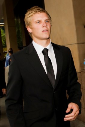 Michael Hurley leaves Melbourne Magistrates Corut yesterday. His blossoming AFL career will be put on hold until round four of this season.