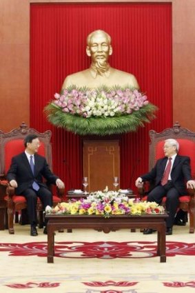Chinese official Yang Jiechi (left) in talks with the Vietnamese Communist Party's General Secretary, Nguyen Phu Trong, in Hanoi on June 18.