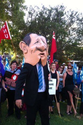 A caricature of Health Minister Lawrence Springborg at the rally to protest the closure of the Brisbane Sexual Health Clinic at Biala House.