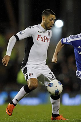 Fulham's Clint Dempsey and Chelsea's Frank Lampard cross paths.