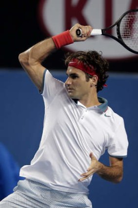 Safely through: Roger Federer.