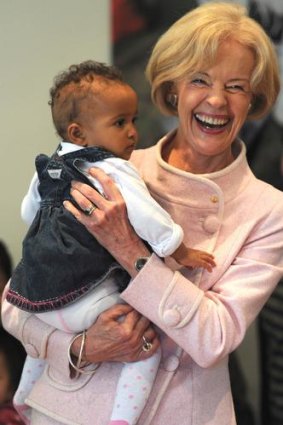 Bryce with Zara Shuttleworth, 9 months, at a Women's Network lunch.