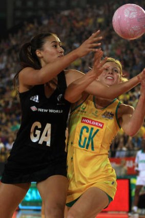 Arch-rivals:  Maria Tutaia (left) of New Zealand contests with Laura Geitz of Australia.