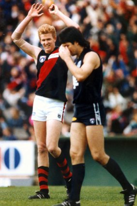 A young Dustin Fletcher looks on as Stephen Kernahan rues a missed shot.