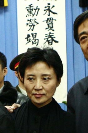 Suspected of diverting funds ... Gu Kailai and Bo Xilai.