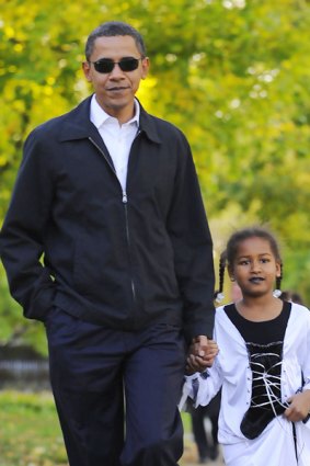 Senator Barack Obama and his daughter Sasha, 7, dressed up for Halloween.
