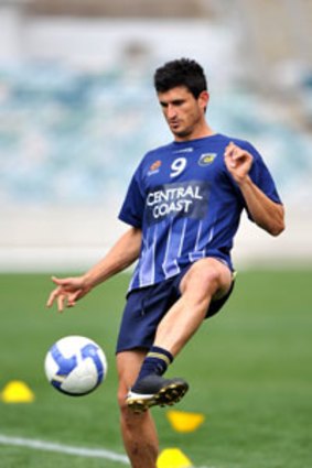 Nik of time ... Central Coast striker Nik Mrdja yesterday signed a temporary deal with Melbourne Victory – on the same day he re-signed with the Mariners