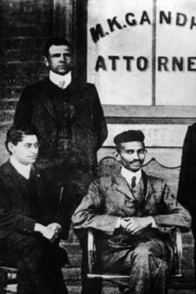 Gandhi, centre, when he was practising as an attorney in South Africa.