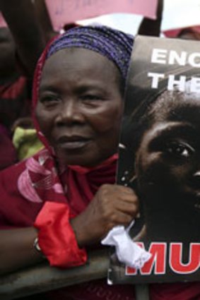 A Nigerian woman demands the release of the abducted schoolgirls.