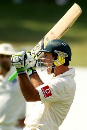 Ricky Ponting celebrates his century in Adelaide yesterday.