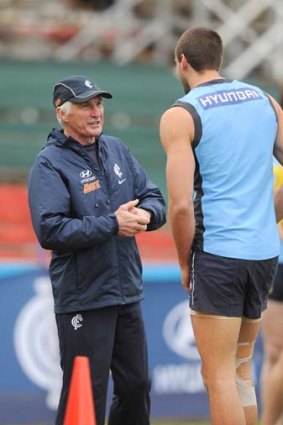 Tall order: Mick Malthouse has some advice for ruckman Shaun Hampson at training.