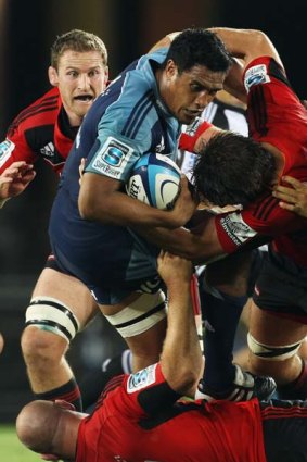Jerome Kaino of the Blues charges forward.
